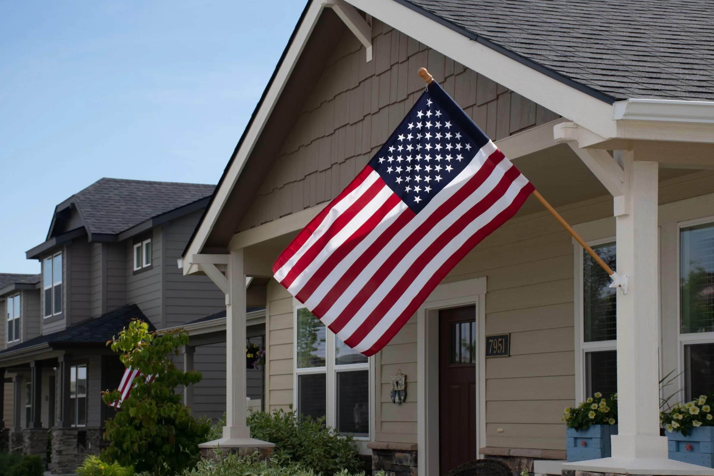 American flag on a craftsman-style porch
